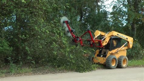 skid steer trimmer|skid steer tree cutting attachment.